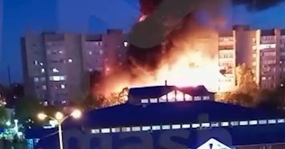 Putin's Russian warplane slams into an apartment block triggering giant fireball