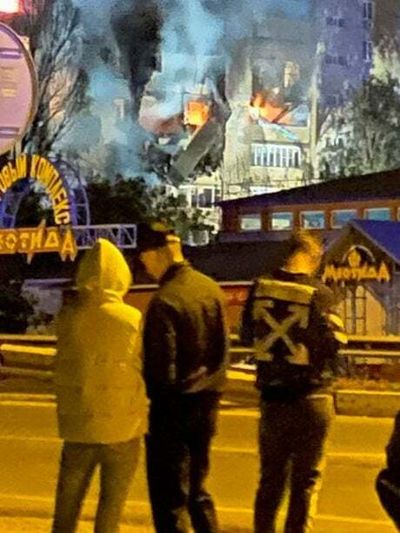 Russia plane crash: Two dead and tower block in flames after military aircraft comes down