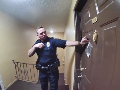 Texas police department apologises as bizarre video captures officer taping bag of milk on man’s door