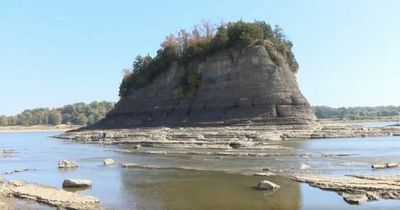 Mysterious rock formation emerges from water for first time as river levels drop