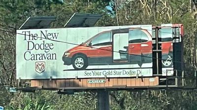 Hurricane Ian’s High Winds Reveal 1996 Dodge Caravan Ad On Billboard