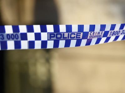 Qld cops charge man, probe woman's death