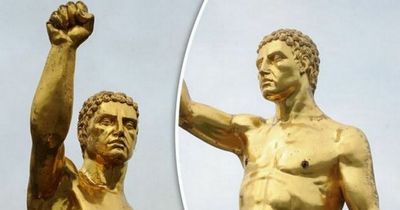 30ft golden statue of naked man moved after row over planning permission