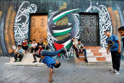 Gaza children breakdance to kick stress away