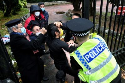 China blames 'troublemakers' after consulate protest assault in UK