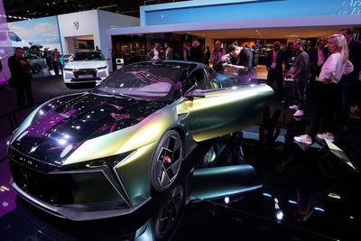 Electric vehicles take center stage at pared-back Paris show