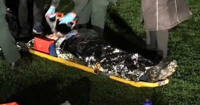 Footballer with suspected spinal injury left waiting five hours on a stretcher in the rain for an ambulance to arrive