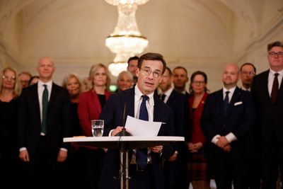 New Swedish PM presents 3-party government