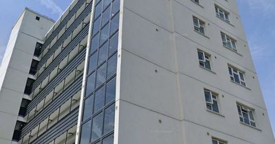 Man scales balcony at Leeds high-rise flats in four-hour police stand-off