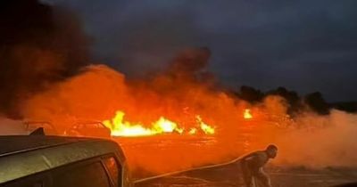 Infernal scenes as commuter plane crashes into car dealership killing two people