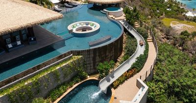 Richard Branson's eye-popping new property with two-storey infinity pool and water slide