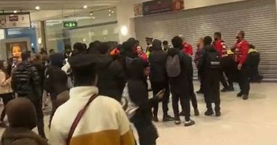 Police forced to break up crowd of 'around 100' young people in Manchester Arndale as five teenagers arrested