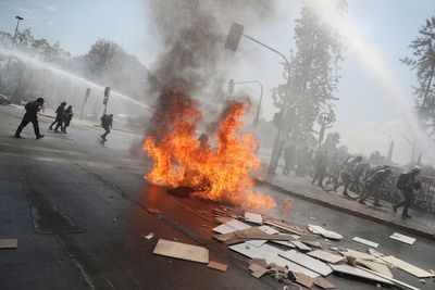 Scattered clashes in Chile mark third anniversary of riots