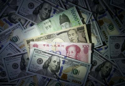 As dollar spikes, can China win the 'currency war'?