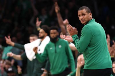 Celtics players celebrated head coach Joe Mazzulla’s first win with a water bottle soaking