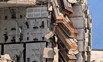 Coffins left hanging in air after second Naples cemetery collapse this year