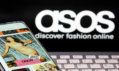 Asos to write off stock and cut costs as shoppers rein in spending on fashion