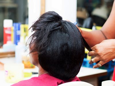 Hair straightening chemicals may increase women's risk of uterine cancer, study finds