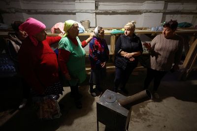 Two villages relish partial power as Ukraine faces blackouts