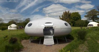 The bonkers Welsh campsite for sale with converted planes, a UFO, submarine and a neon speedboat