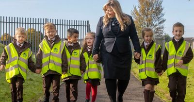 Housebuilder donates hi-vis vests to improve school travel safety for children in Lanarkshire village