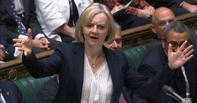 Liz Truss clings to power after an evening of chaos as Tory MPs are 'manhandled' in vote