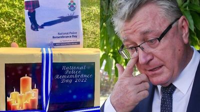 North Queensland MP Les Walker apologises for gifting book Forensics for Dummies at police memorial