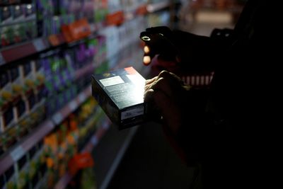 Defiant Ukrainians wrap up warm to face power outages