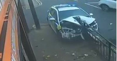CCTV captures terrifying moment police car ploughs into metal barrier in horror smash