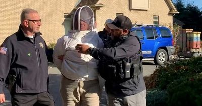 Women unleashes swarm of bees on police officers as they enforce eviction notice