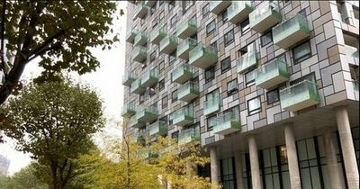 Man plunges to death from London tower block and woman injured as police launch probe