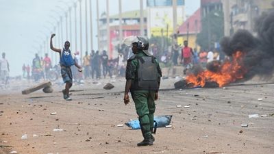Gunshots reported as demonstrators defy ban to protest against Guinea's junta