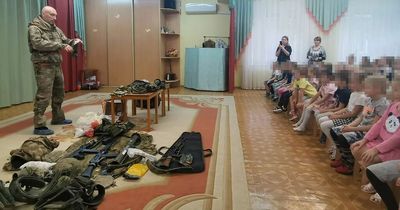 Children as young as 4 given war lessons and presented guns in Vladimir Putin's Russia