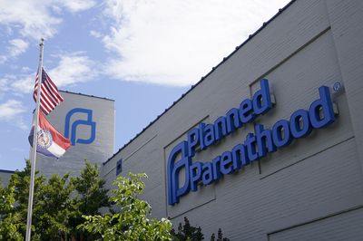 A former employee sues Planned Parenthood, claiming she faced months of racism