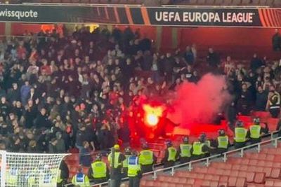 PSV fans throw flare at Arsenal supporters as crowd trouble mars Europa League game