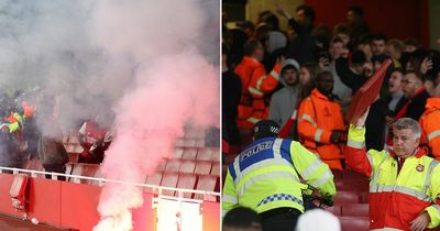 UEFA launch investigation as PSV fans rip out seats and fire flare at Arsenal supporters