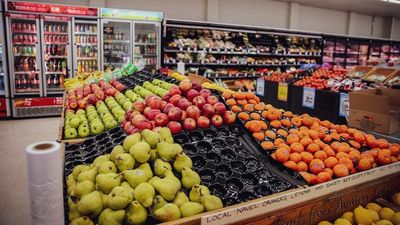 Widespread floods will force inflation above 8 per cent for fruit and vegetables, treasurer says