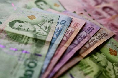 Baht drifts lower as Asian currencies fall