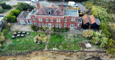 Couple forced to demolish £2million home before it FALLS into the sea