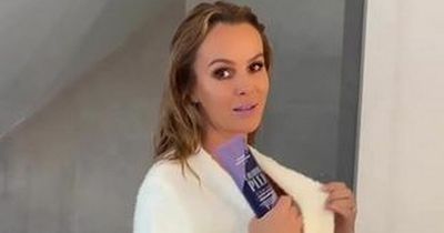 Amanda Holden suffers accidental wardrobe malfunction while whipping off dressing gown