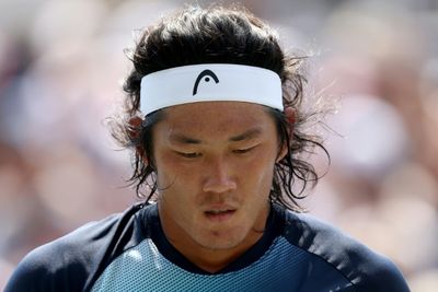 Zhang becomes China's first man in tennis top 100