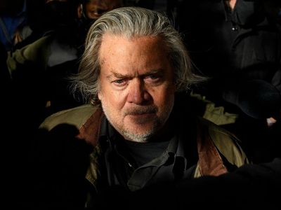 Steve Bannon accidentally points to sign reading ‘jail all coup plotters’ amid contempt trial