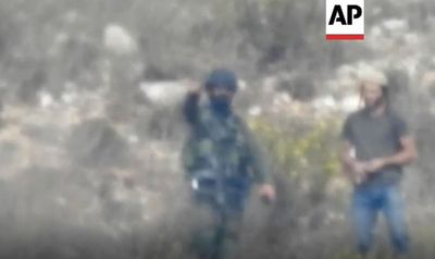 Video: Israeli guard, settler join forces in West Bank clash