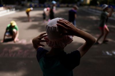Ukraine authorities attempt to track down thousands of ‘social orphans’