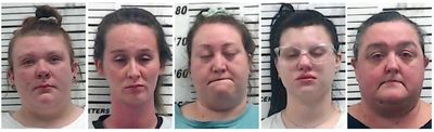 Day care workers charged, accused of scaring tots with mask