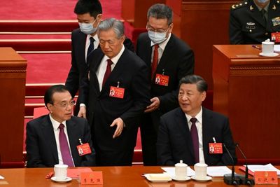 Former Chinese president Hu unexpectedly leaves Congress closing ceremony