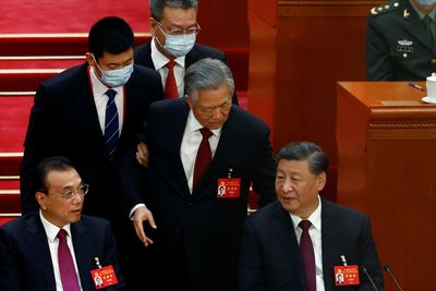 Chinese ex-President Hu Jintao escorted out of party congress