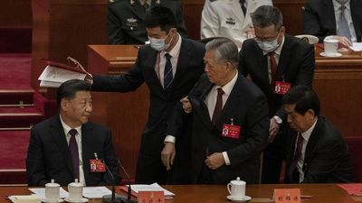 Former Chinese leader escorted out of Communist Party Congress