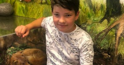 Boy, 12, killed when garage wall collapsed was 'well-loved' son