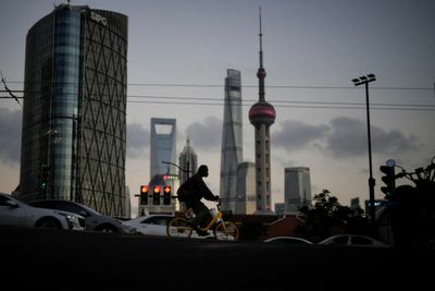 China Q3 GDP growth rebounds at faster pace but risks loom